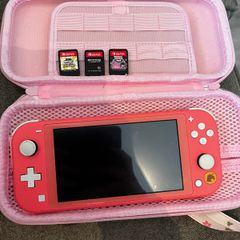 Nintendo switch with three games
