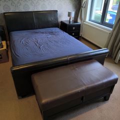 King size bed and leather headboard