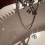 Corner bath with Panelling and Avondale Taps Image 6
