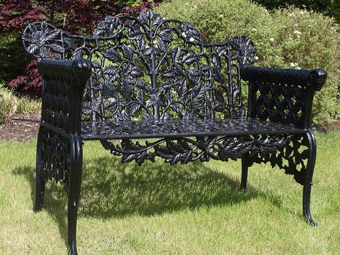 Pair cast iron black ram benchs
