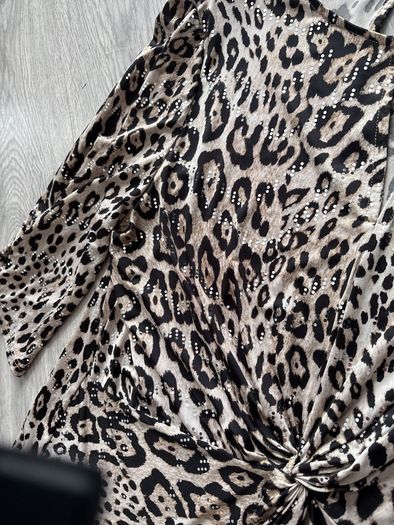 ladies top  shiny design all through it