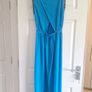 Ladies vibrant blue full-length dress with sleeve detail and back detail. Image 2