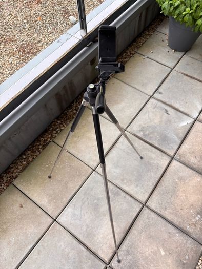 Lightweight tripod for phone or camera, with remote