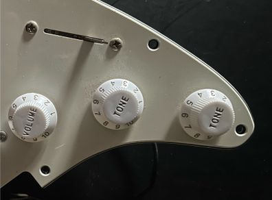Fender Squier Stratocaster harness wired up to volume pot 2 tone potentiometers