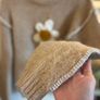 Mix wool jumper with handwoven flower Image 4