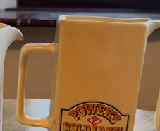 Powers whiskey jug