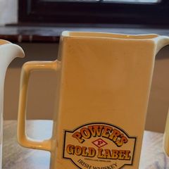 Powers whiskey jug