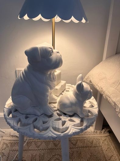 Two ceramic dog ornaments