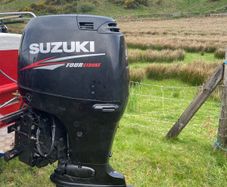 Suzuki 90 HP 4 stroke long shaft.