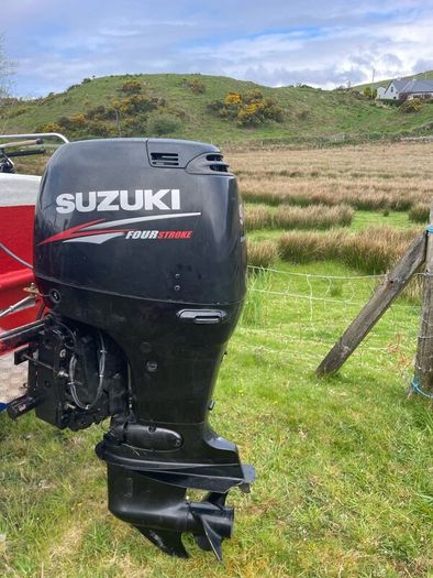 Suzuki 90 HP 4 stroke long shaft.