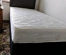 Single bed with matress and headboard