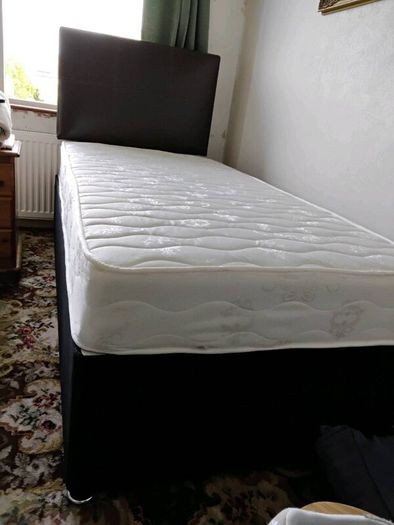 Single bed with matress and headboard