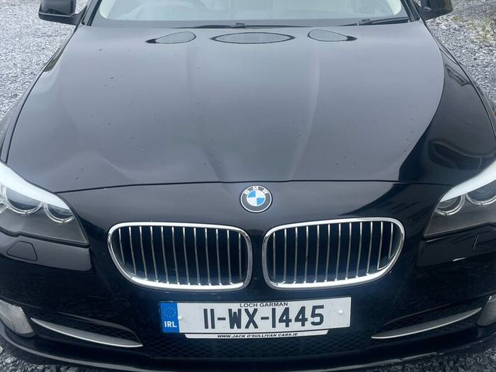 BMW 5 series, black with cream leather interior