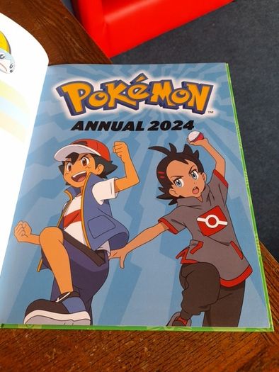 Two Pokemon books E2 each
