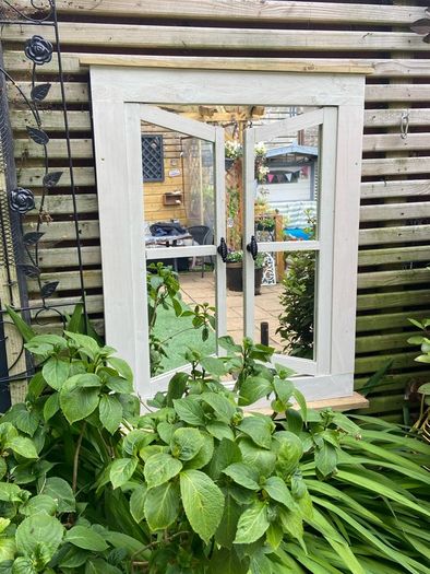 Garden reflection mirror window