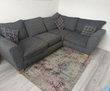 L shaped couch dark grey