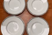 Set of 4 Vintage Royal Doulton Saucers