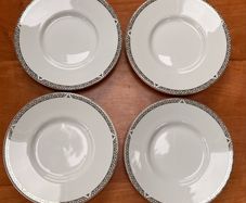 Set of 4 Vintage Royal Doulton Saucers