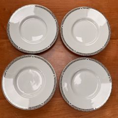 Set of 4 Vintage Royal Doulton Saucers