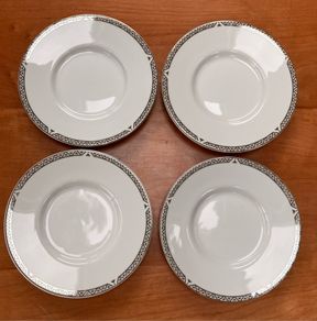 Set of 4 Vintage Royal Doulton Saucers