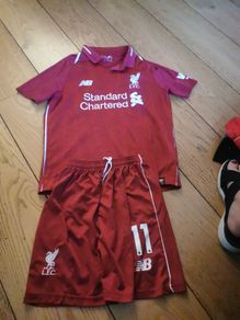 Liverpool jersey and shorts