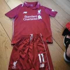 Liverpool jersey and shorts