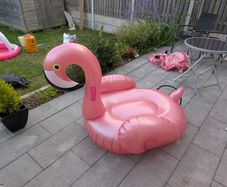 TWO inflatable flamingos