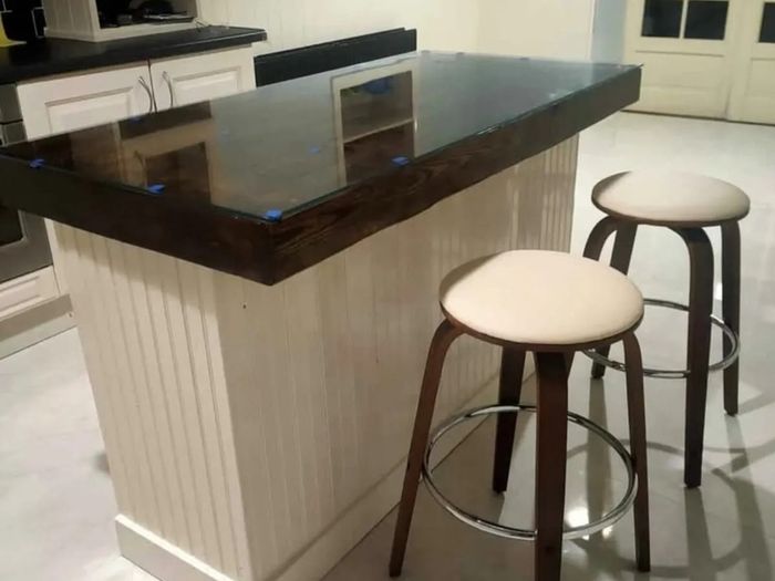 Rustic kitchen island with double overhang