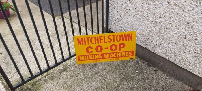 Mitchelstown hay barn advertising,sign by currans of Clonmel,,original ,came out of the offices in mitchelstown branch ,,,few marks  ,lovely advertising display item, for any garage ,man cave or personal collection, sold as is