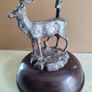 This magnificent stag ornament perfectly captures the proud stance of the  and will make an eye-catching focal point in any room SET ON DARK WOOD DOME. Image 3