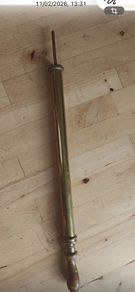 Antique brass football pump