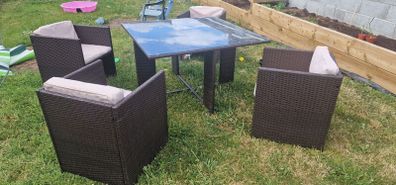 Rattan glass top table and 4 chairs