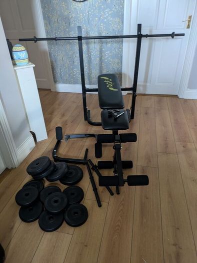weight bench with weights and bars