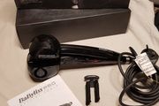 BaByliss PRO Perfect Curl styling tool, highlighting its "Auto Curl technology for creating effortless curls.