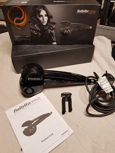 BaByliss PRO Perfect Curl styling tool, highlighting its "Auto Curl technology for creating effortless curls.