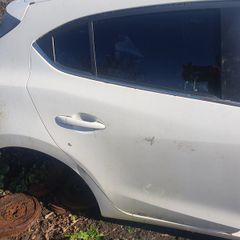 Mazda 3 driver rear door hatchback