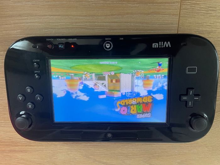 Modded Nintendo Wii U 32GB CIB Premium Pack with 128GB SD, Aroma, English Menu, Free Games and Retro Games NES SNES N64 PS1 SEGA Gameboy etc.