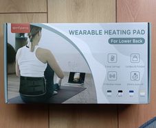 Heating and vibration pad for lower back
