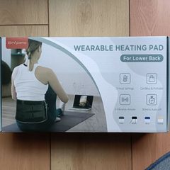 Heating and vibration pad for lower back