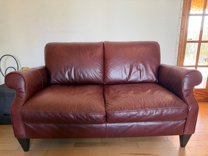 Genuine Leather 2 seater sofa w/ matching pouffe