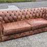 Premium leather sofa solid wood base very good condition Image 2