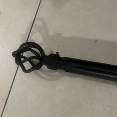 Black curtain pole extends to 7ft