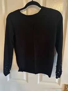 Black jumper with embellishment on cuffs. Size s or 10