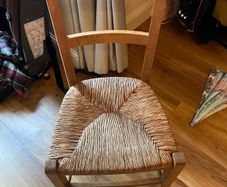 Vintage ladder back chair with woven rush seat