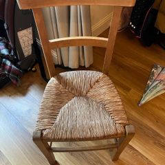 Vintage ladder back chair with woven rush seat