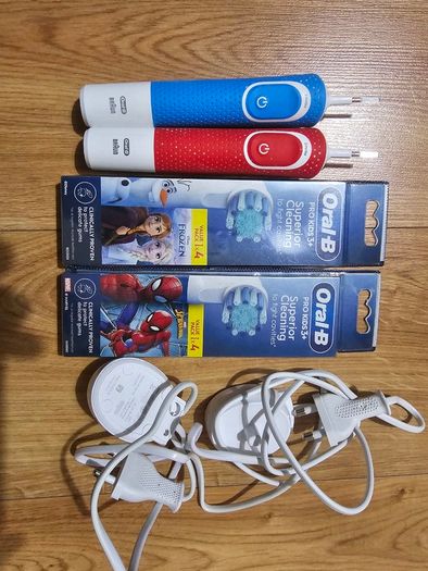 Oral b kids electric toothbrush x 2,brand new 8 heads and two charger