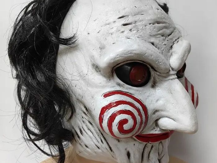 The saw Halloween latex mask with hair.