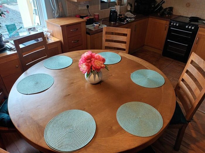 Large round oak table with 4 chairs