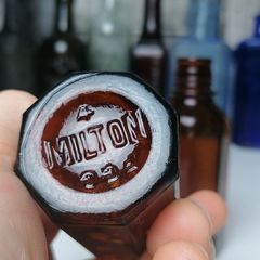 83 - Two Vintage Milton Brown Glass Bottles Bottom Embossed Letters