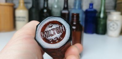 83 - Two Vintage Milton Brown Glass Bottles Bottom Embossed Letters